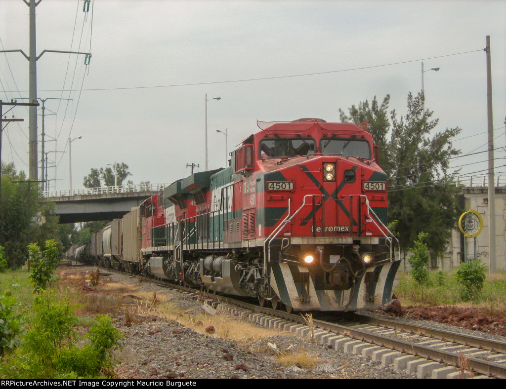 FXE AC4400 Locomotive leading a train